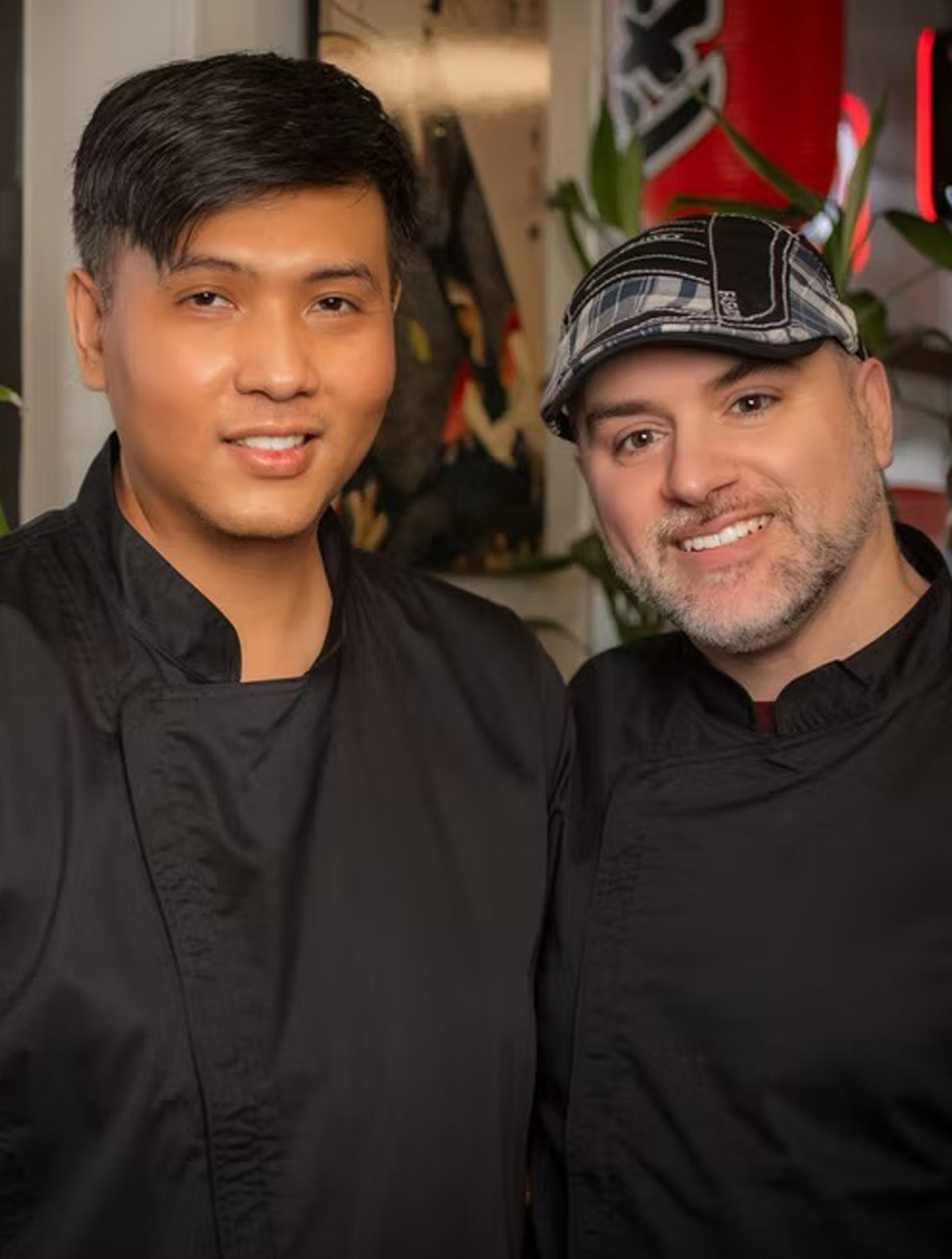 Chefs Paponake and Alan plating ramen in the Doragon kitchen